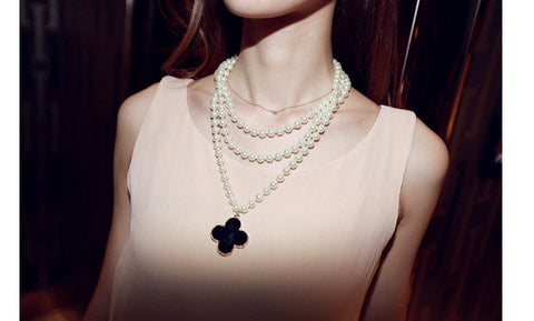 Limited Edition Pearl Necklace with Black Clover Design